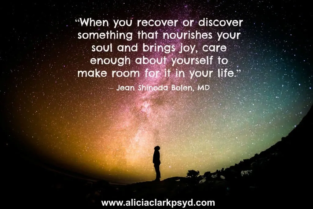 Silhouetted figure standing under a colorful starry sky with inspirational quote about self-care and nourishing your soul