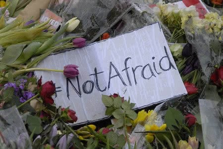 36886599 - copenhagen/denmark.  24 february 2015-memorial of late finn norgaard who was died in terrorest attacked krudttonder culture cafe  on osterbro on sunday night during debate meeting with swedish cartoonest here are various message with flowers including dan